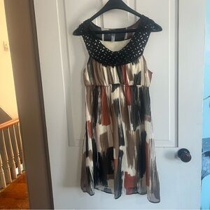 Chic Sleeveless Midi Dress with Abstract Print